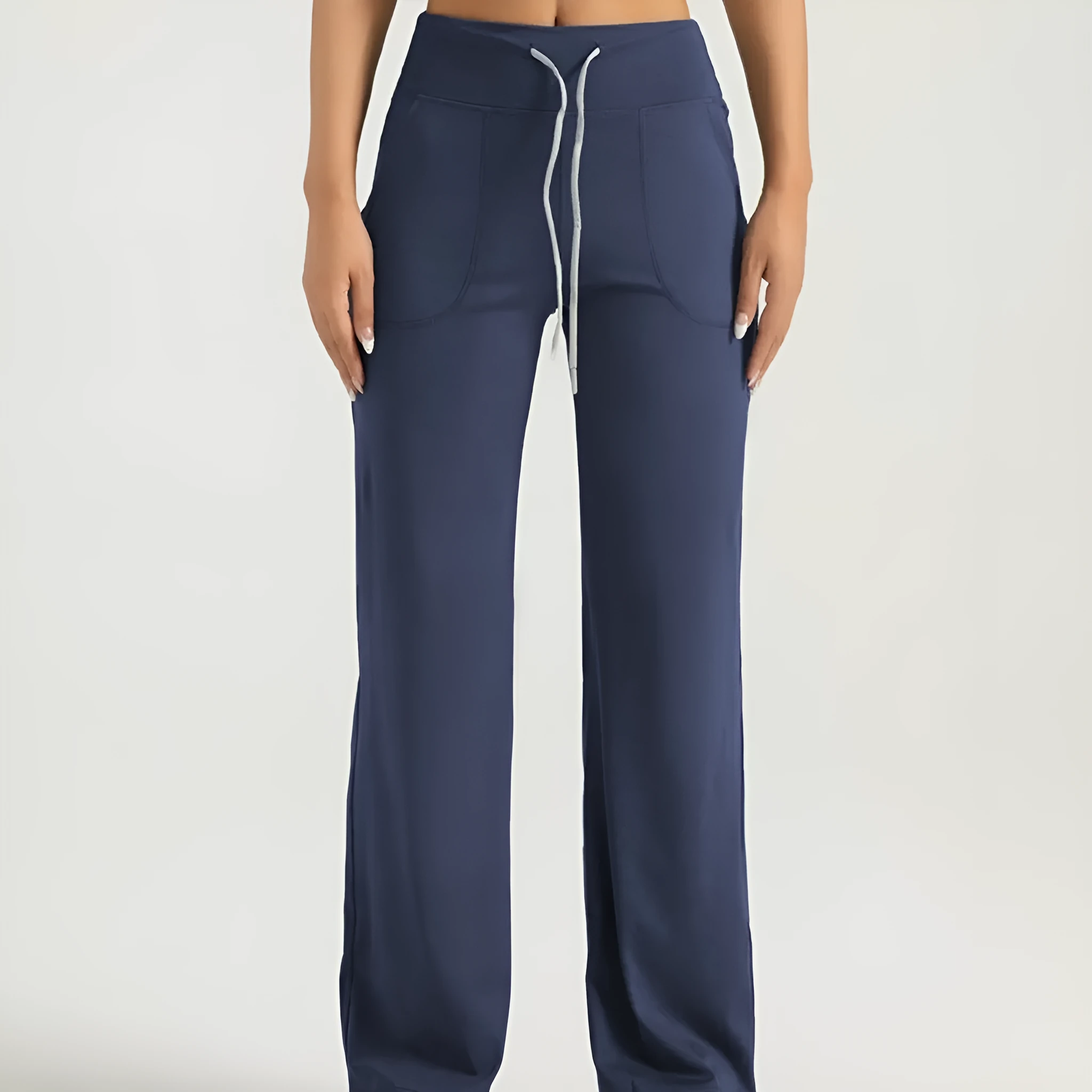 Women's high waist loose fit drawstring sports trousers in Star Black, side view, with elastic waistband and straight leg.