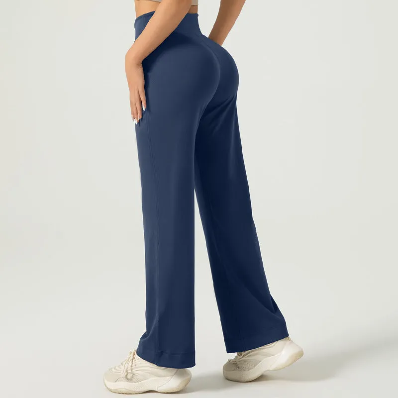 Women's high waist loose fit drawstring sports trousers in Star Black, side view, with elastic waistband and straight leg.