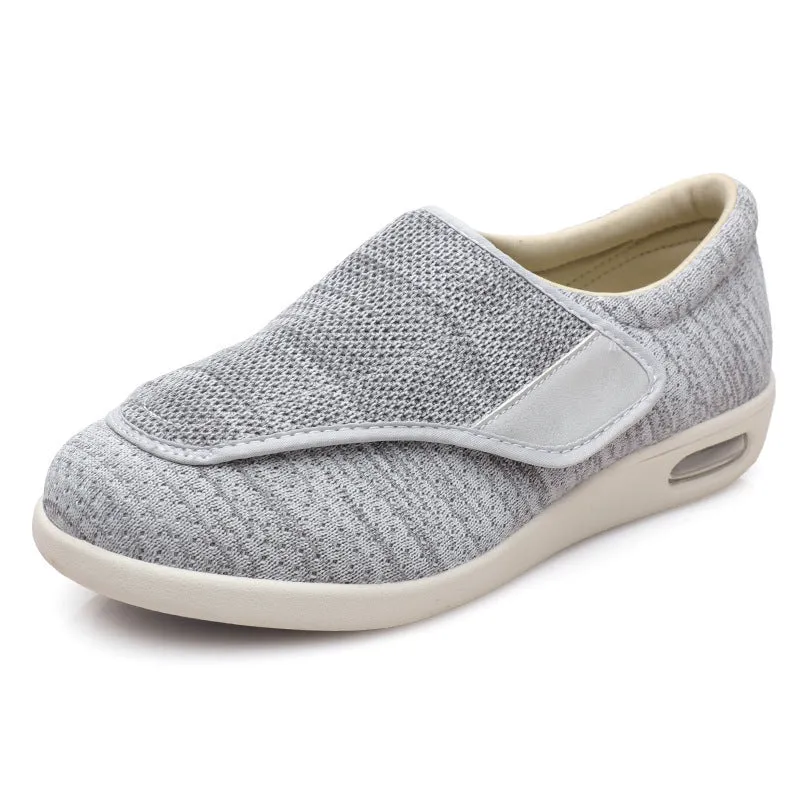 Wide fit elderly shoes with Velcro closure, round toe, and cushioned rubber sole in black colour option