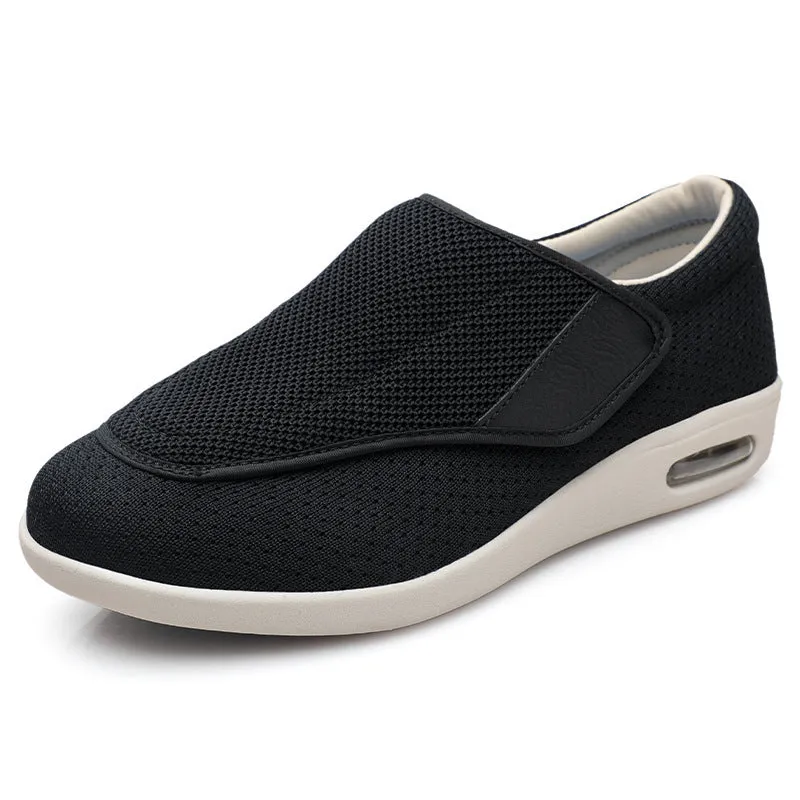 Wide fit elderly shoes with Velcro closure, round toe, and cushioned rubber sole in black colour option