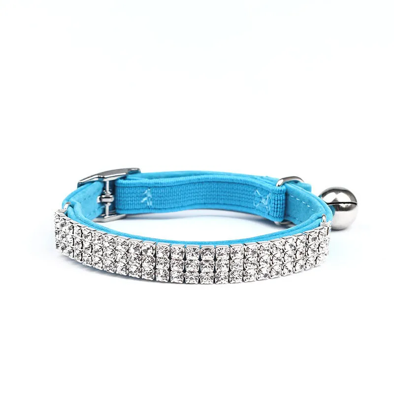 Red velvet suede cat collar with a central silver rhinestone, showing adjustable buckle on a 1cm wide band.