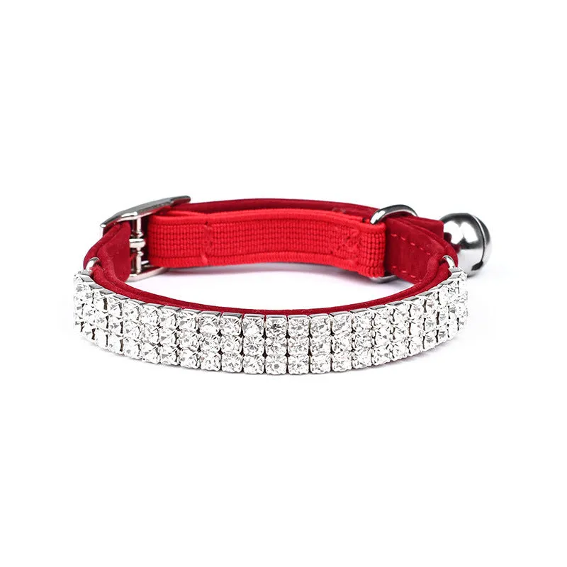 Red velvet suede cat collar with a central silver rhinestone, showing adjustable buckle on a 1cm wide band.