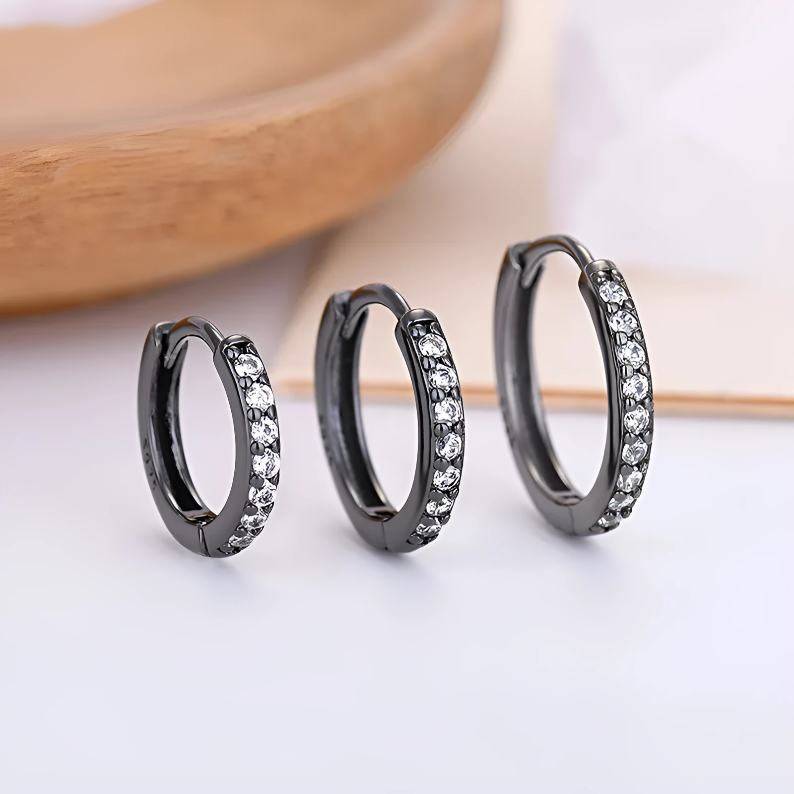 Gang Drill Zircon stud earrings in silver with geometric starry sky design, unisex style