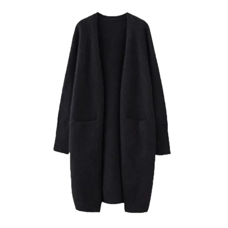 Women loose mid-length knitted cardigan in solid colour with long sleeves and pockets.