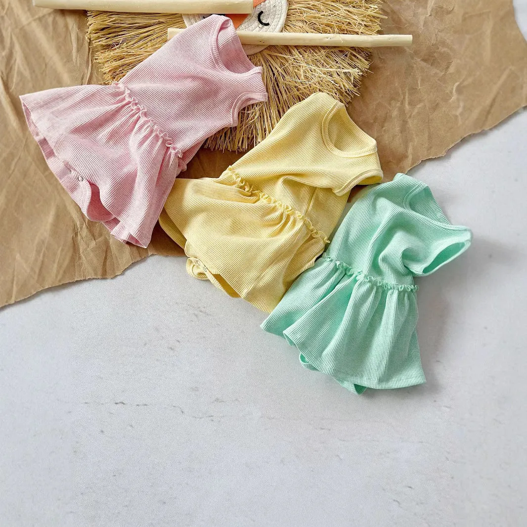 Baby girl sleeveless cotton waffle vest onesie in triangle jumpsuit style, three colour options available