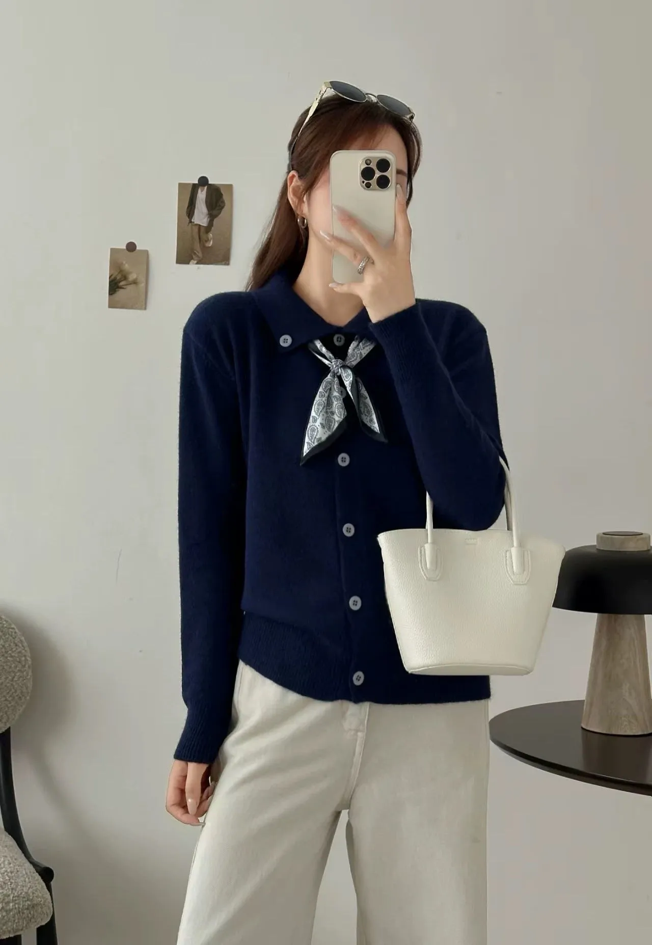 Beige lapel scarf style acrylic cardigan sweater with long sleeves and splicing detail.
