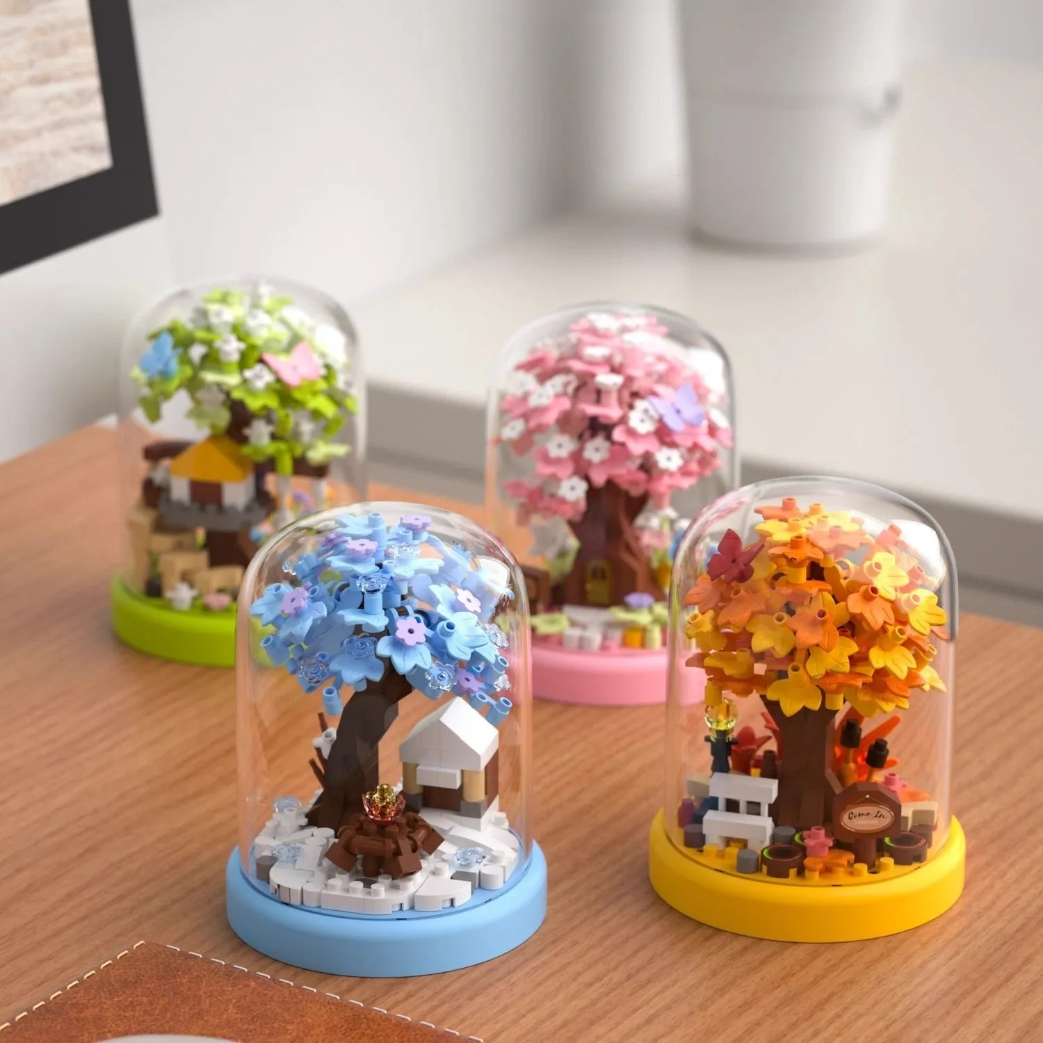 Micro particle building block set showing Cherry Blossom Tree House model in colour box