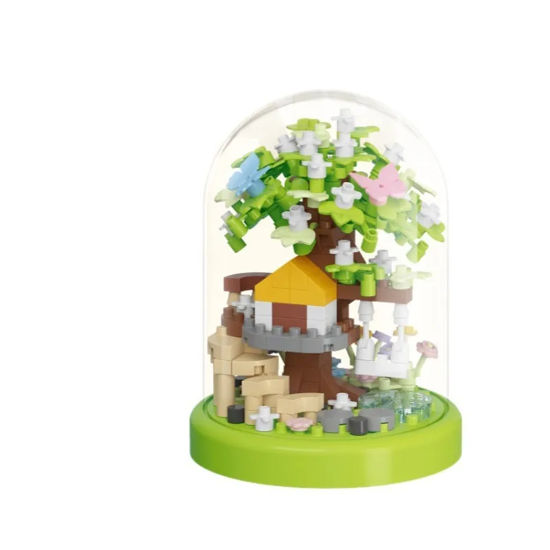 Micro particle building block set showing Cherry Blossom Tree House model in colour box
