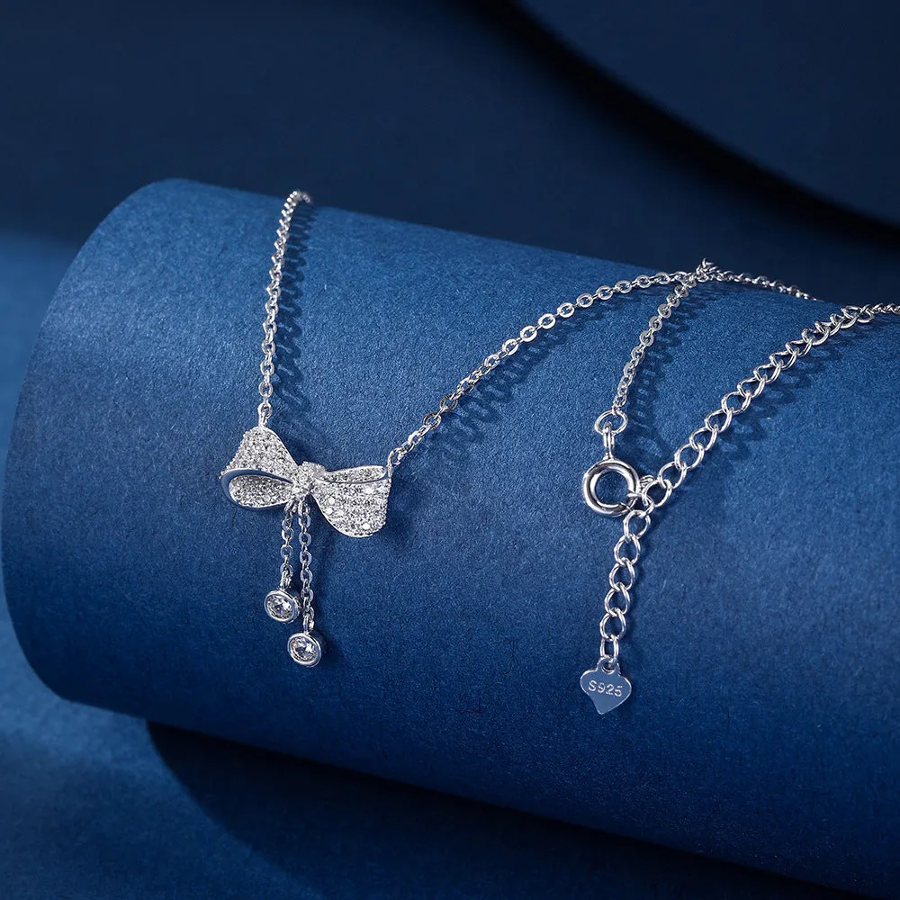 Sterling silver bow necklace with adjustable 40-45cm chain and O-ring design