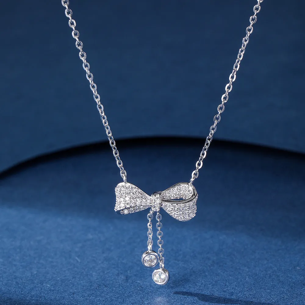 Sterling silver bow necklace with adjustable 40-45cm chain and O-ring design