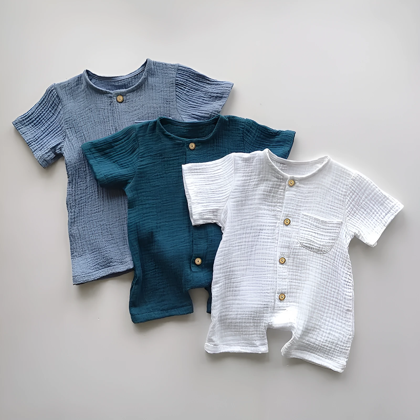 Cotton short-sleeved infant romper in peacock green, casual style for boys and girls, size 73