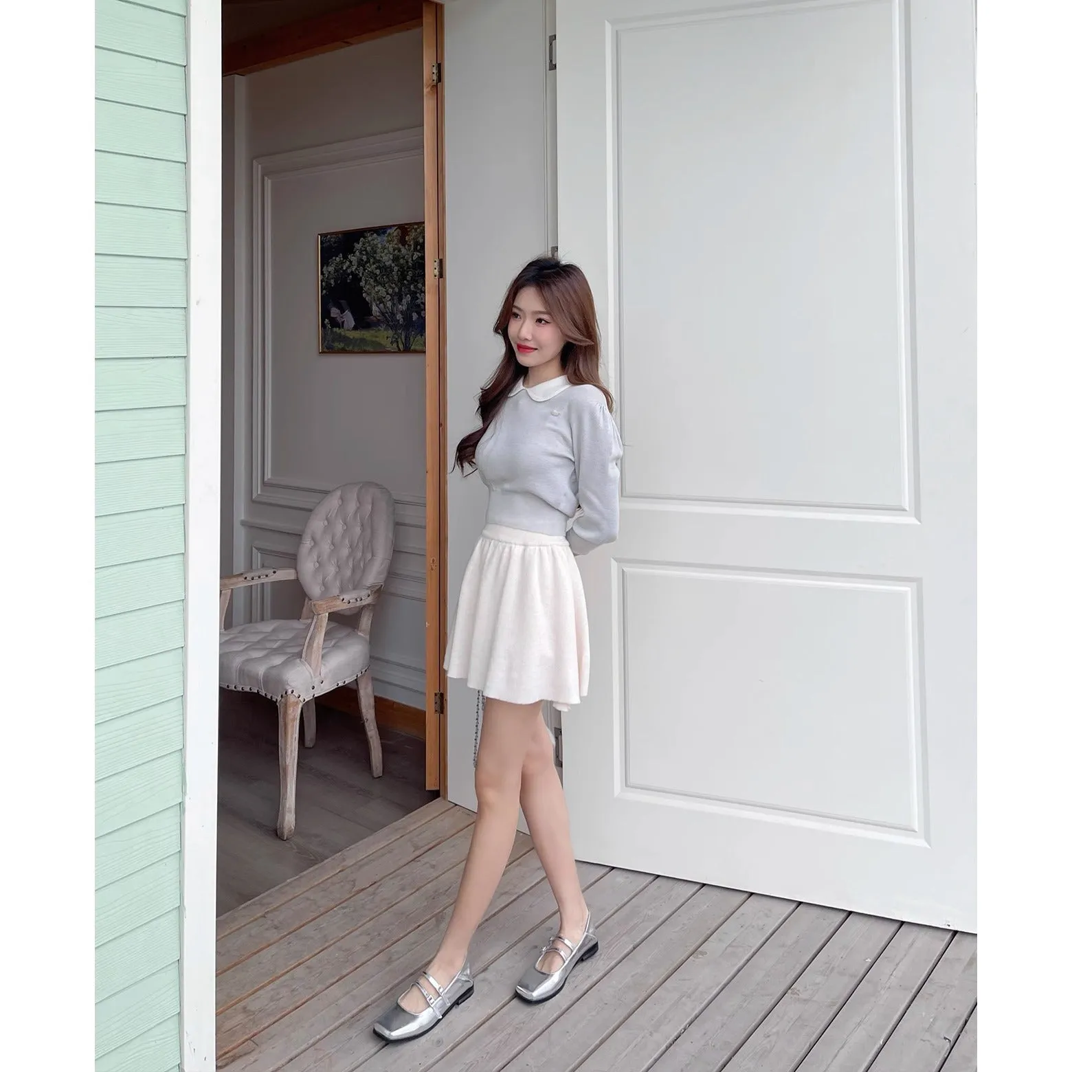 Women's silver leather Mary Jane ballet pumps with cross buckle strap and flat low heel.