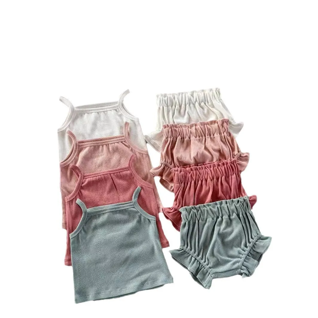 Women's cotton rib home wear two-piece set with sleeveless top and shorts in rose colour on white background
