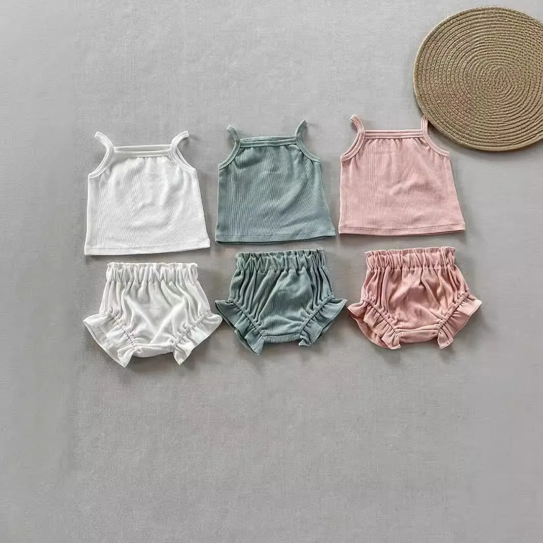 Women's cotton rib home wear two-piece set with sleeveless top and shorts in rose colour on white background
