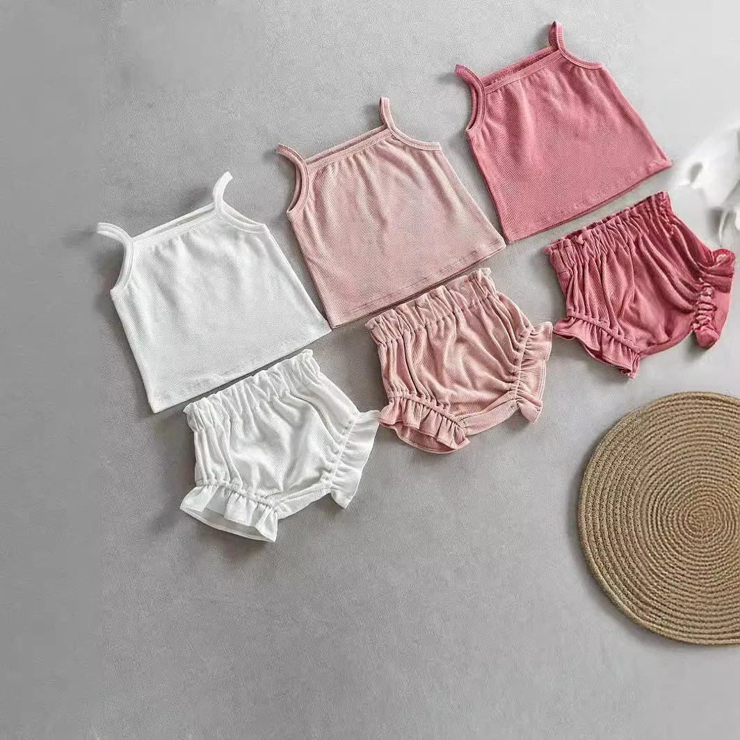 Women's cotton rib home wear two-piece set with sleeveless top and shorts in rose colour on white background