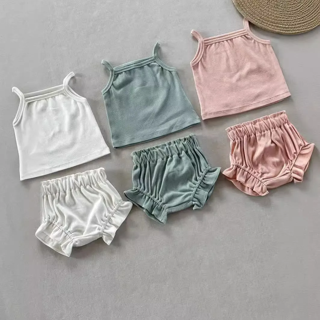 Women's cotton rib home wear two-piece set with sleeveless top and shorts in rose colour on white background