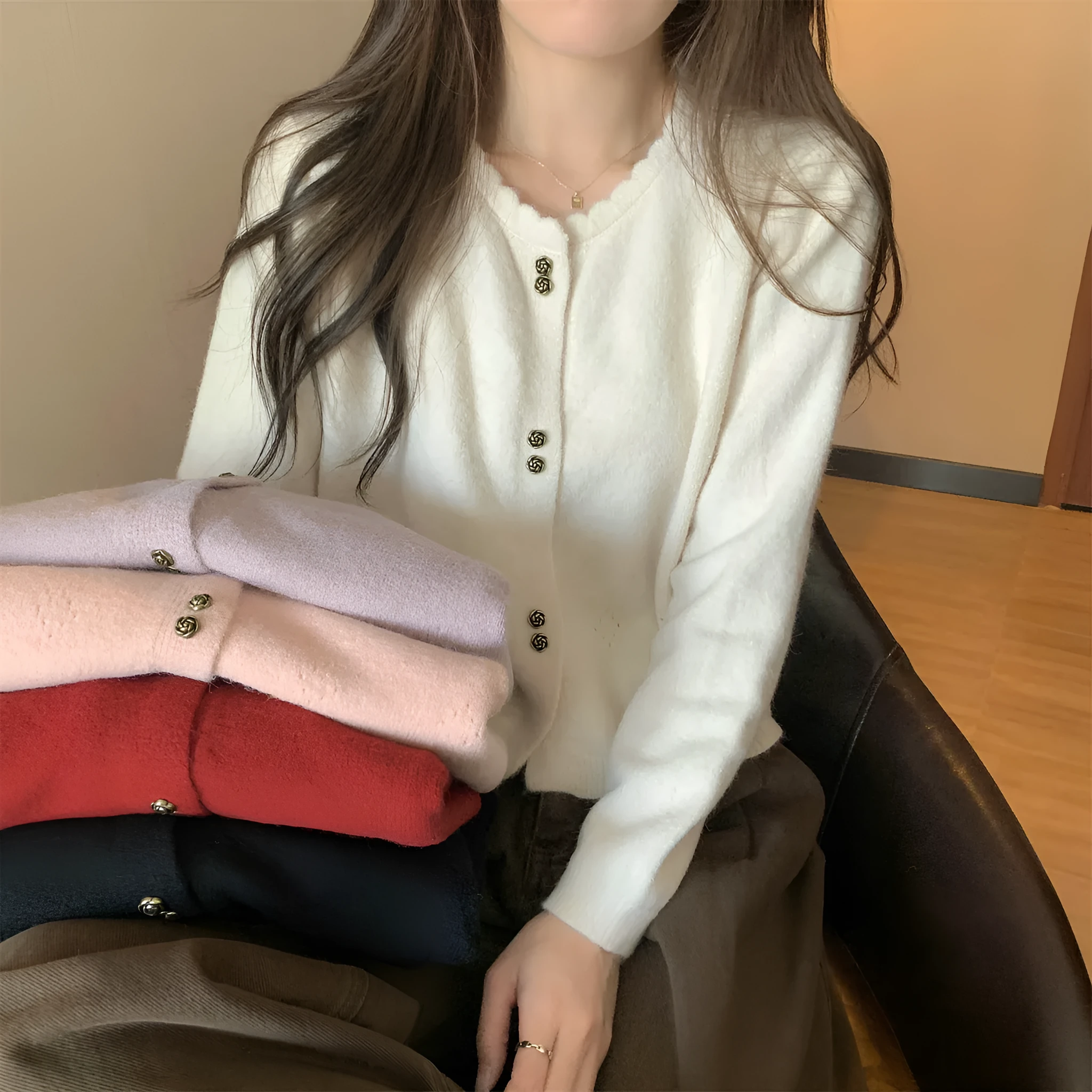 Women's milky white acrylic long-sleeved cardigan coat worn open, showing regular fit and free size.