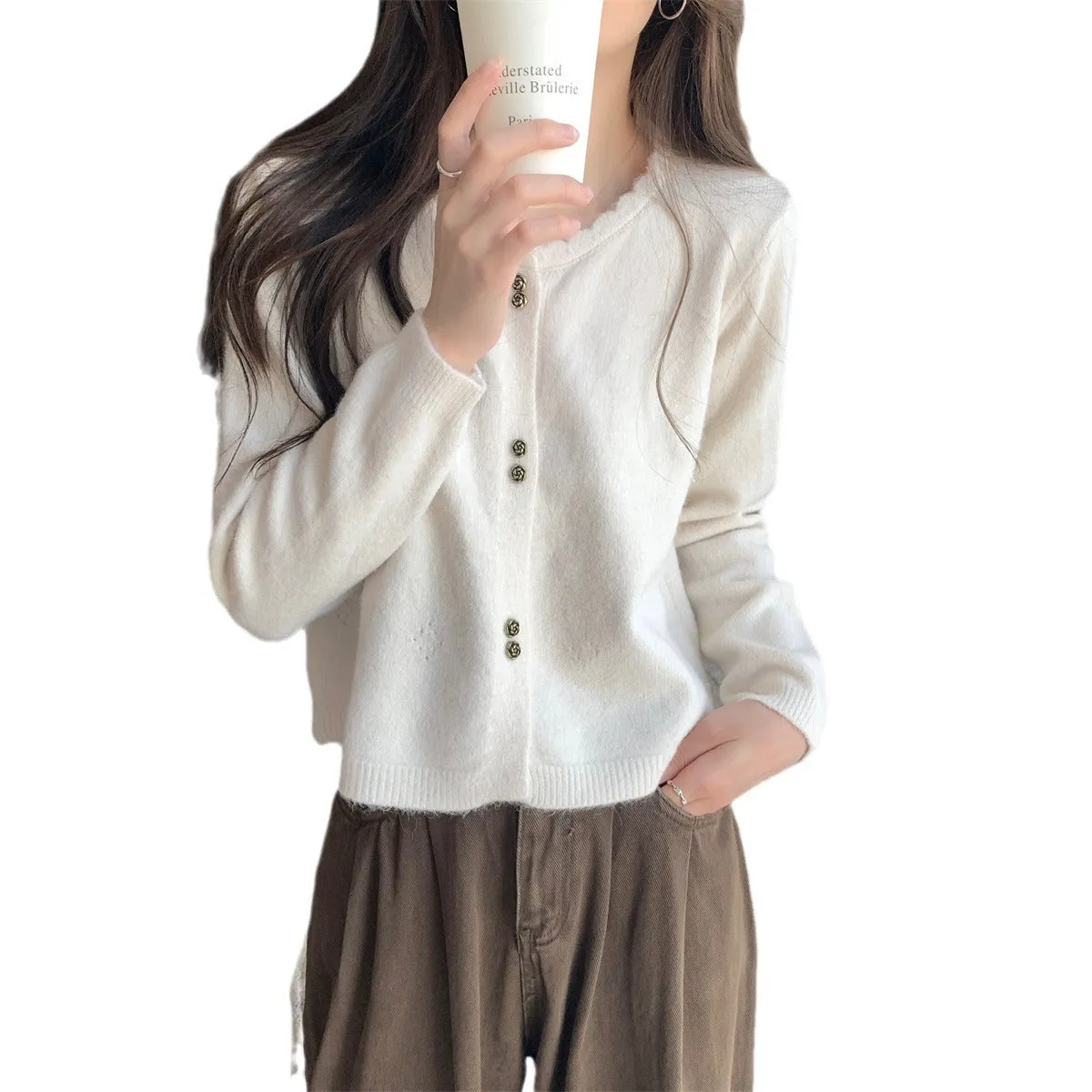 Women's milky white acrylic long-sleeved cardigan coat worn open, showing regular fit and free size.