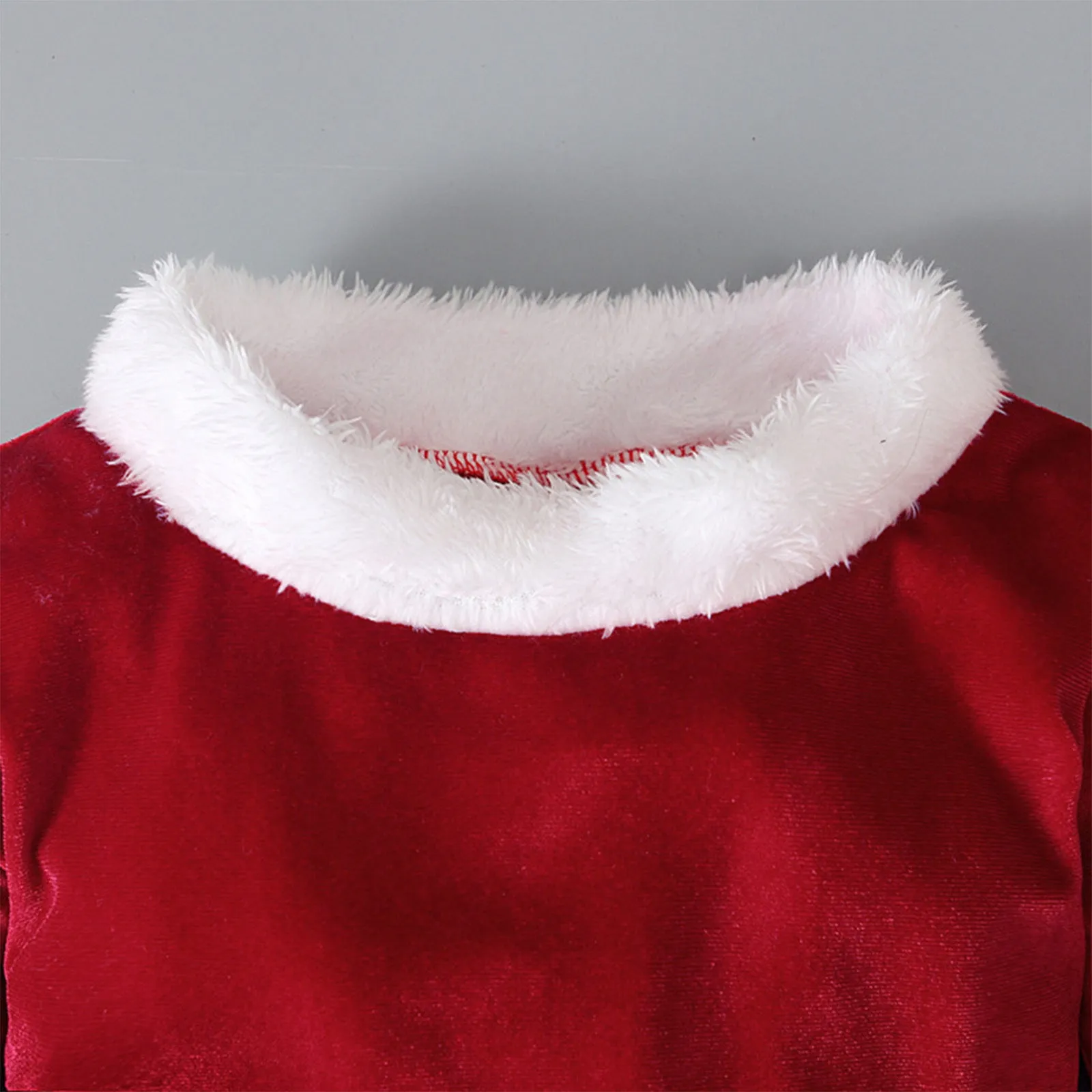 Red Korean velvet three-piece children's Christmas set with long-sleeved shirt, bell bottoms, and hat on child