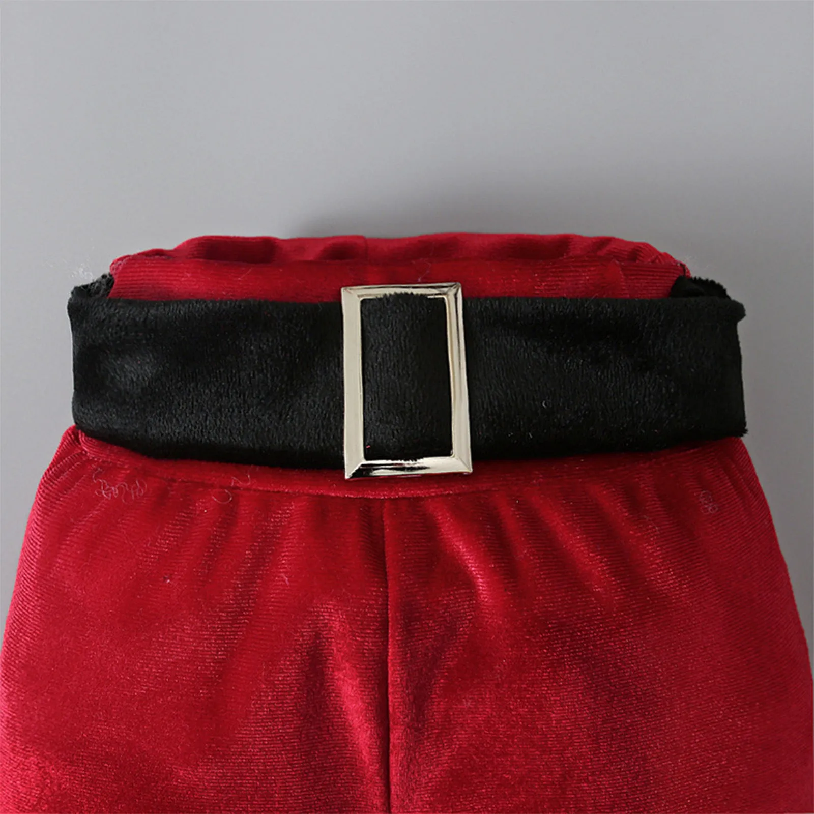 Red Korean velvet three-piece children's Christmas set with long-sleeved shirt, bell bottoms, and hat on child