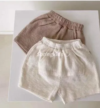 Solid colour cotton baby romper with short sleeves and loose fit for summer, unisex triangle climbing style