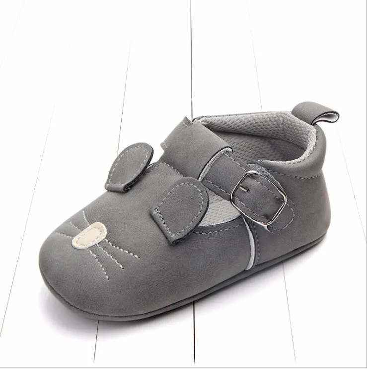 Spring autumn cartoon animal baby shoes in beige panda design with matte nubuck leather upper and soft non-slip sole.