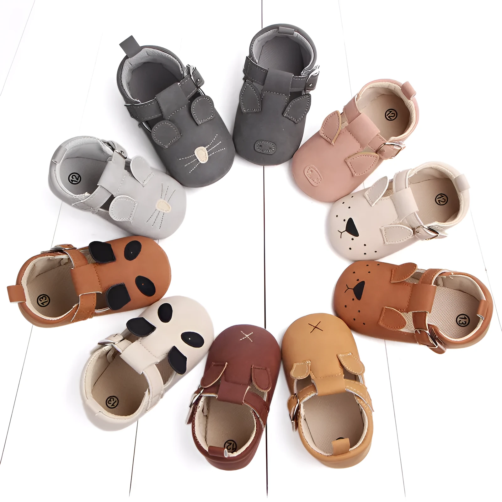 Spring autumn cartoon animal baby shoes in beige panda design with matte nubuck leather upper and soft non-slip sole.