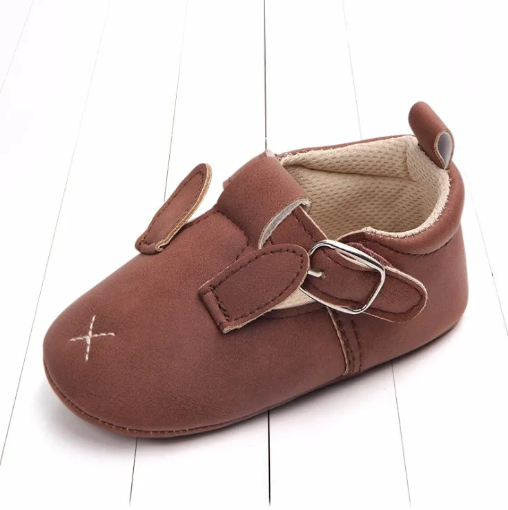 Spring autumn cartoon animal baby shoes in beige panda design with matte nubuck leather upper and soft non-slip sole.