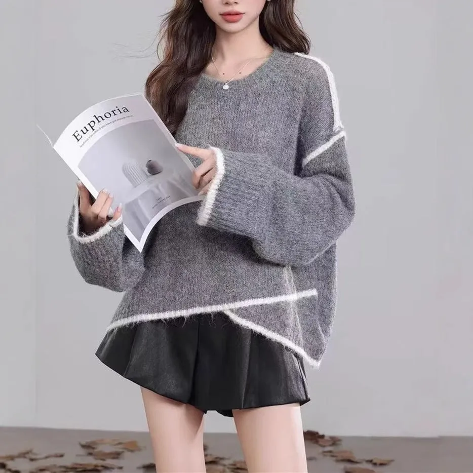 Women's idle style gray cotton loose pullover sweater on a plain background