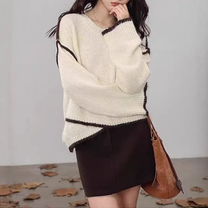 Women's idle style gray cotton loose pullover sweater on a plain background