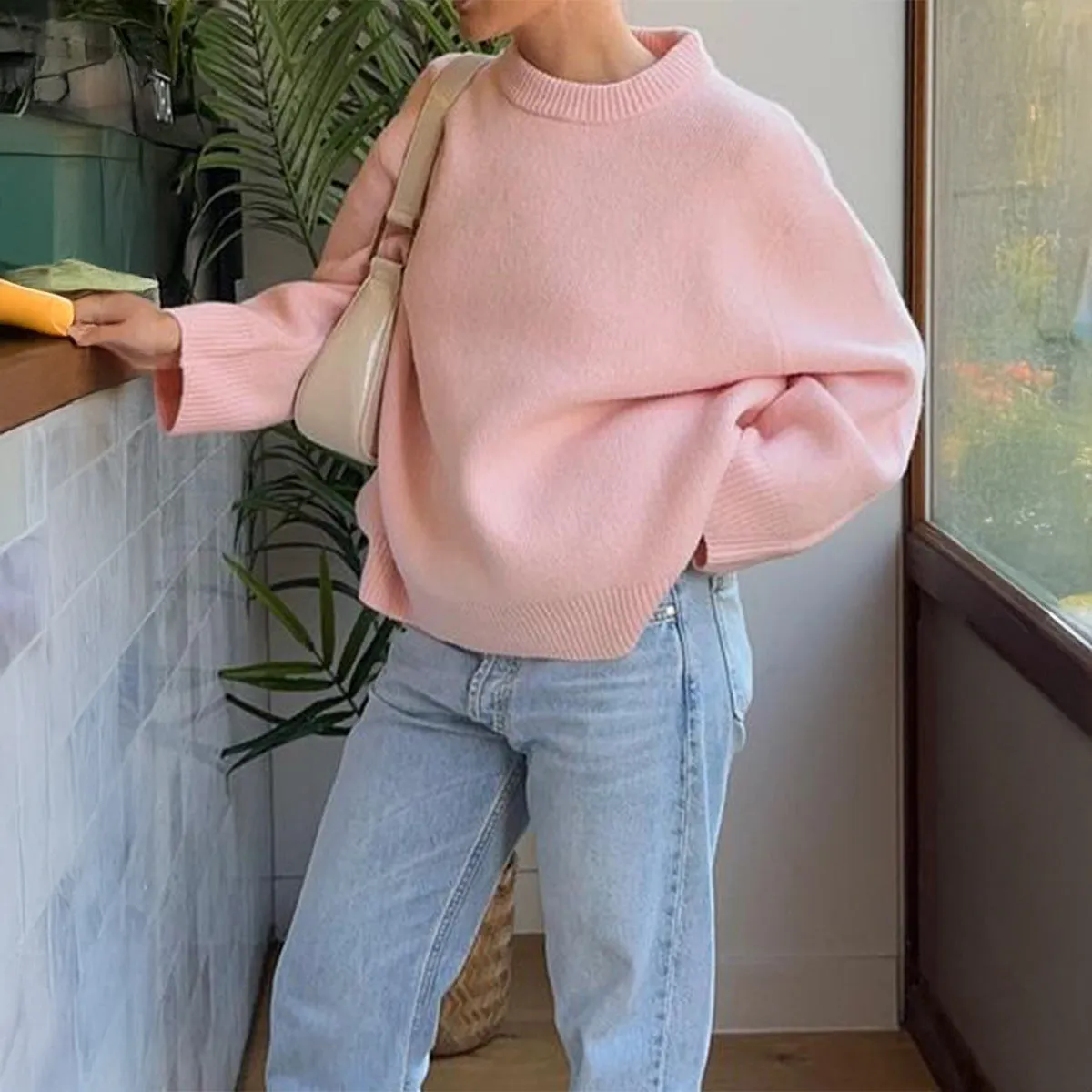 Casual polyester long-sleeved solid colour pullover sweater for women, available in multiple colours and sizes S to XL