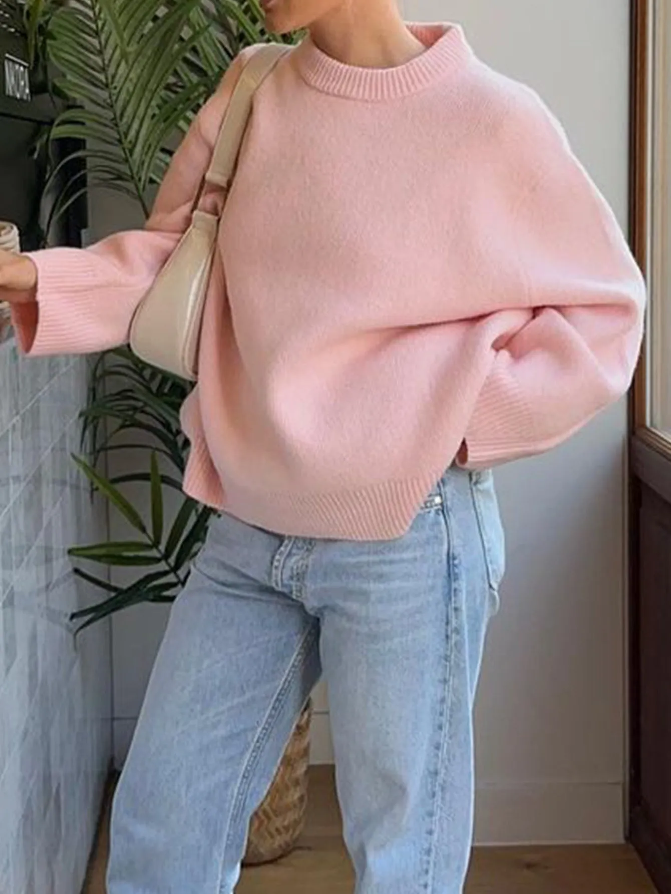 Casual polyester long-sleeved solid colour pullover sweater for women, available in multiple colours and sizes S to XL