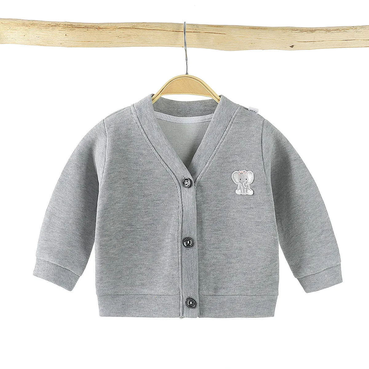 Baby girls cotton cardigan in blue with long sleeves and single-breasted closure, soft treatment finish