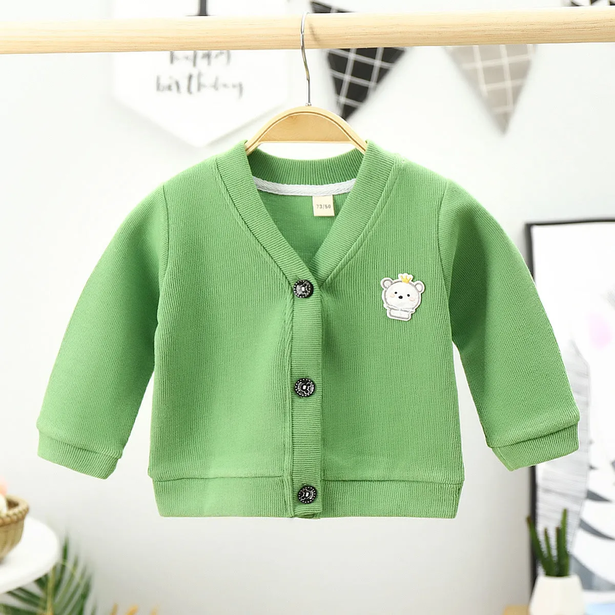 Baby girls cotton cardigan in blue with long sleeves and single-breasted closure, soft treatment finish
