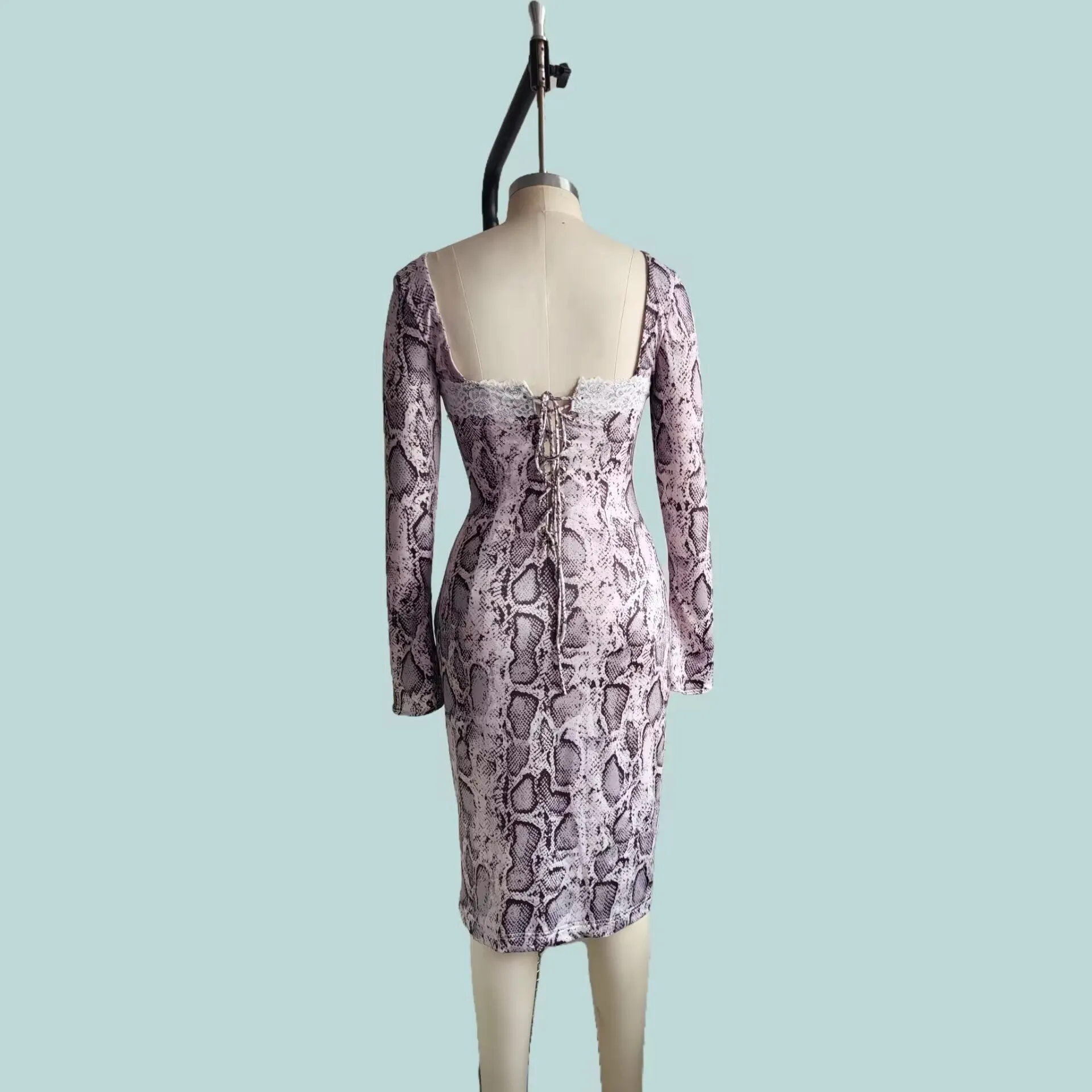 Grey slim fit women's lace dress with long sleeves, A-line skirt, and a digital 3D printed pattern.