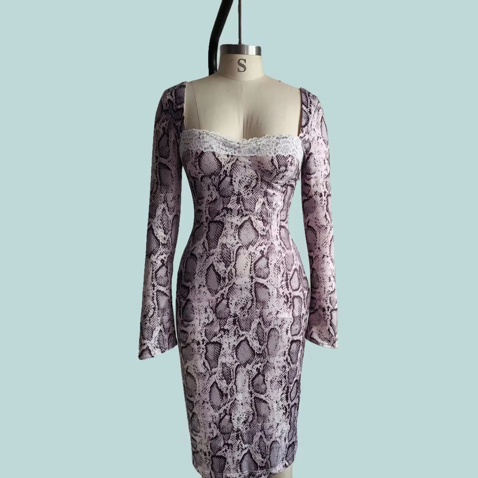 Grey slim fit women's lace dress with long sleeves, A-line skirt, and a digital 3D printed pattern.