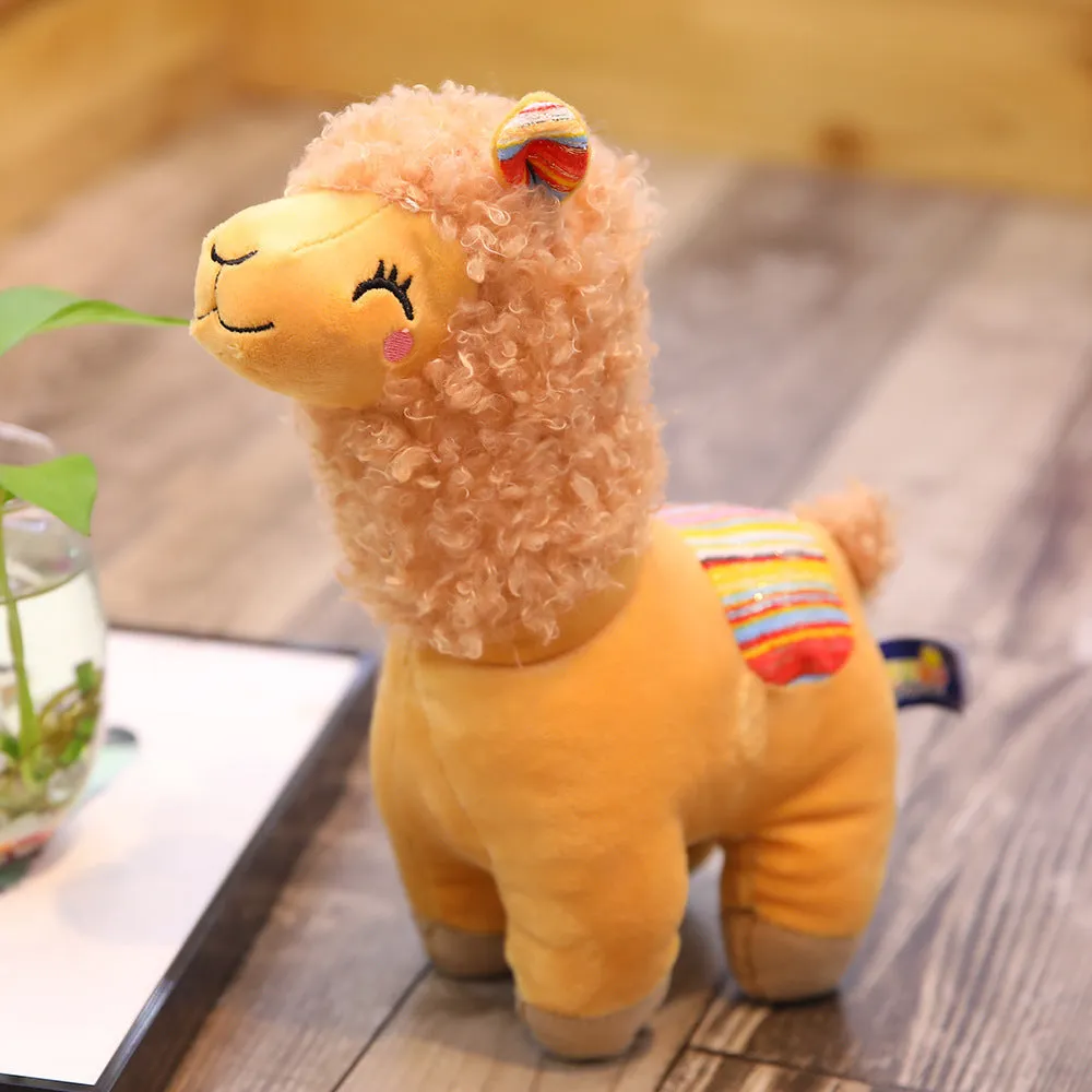 Alpaca llama plush toy in white standing on a surface