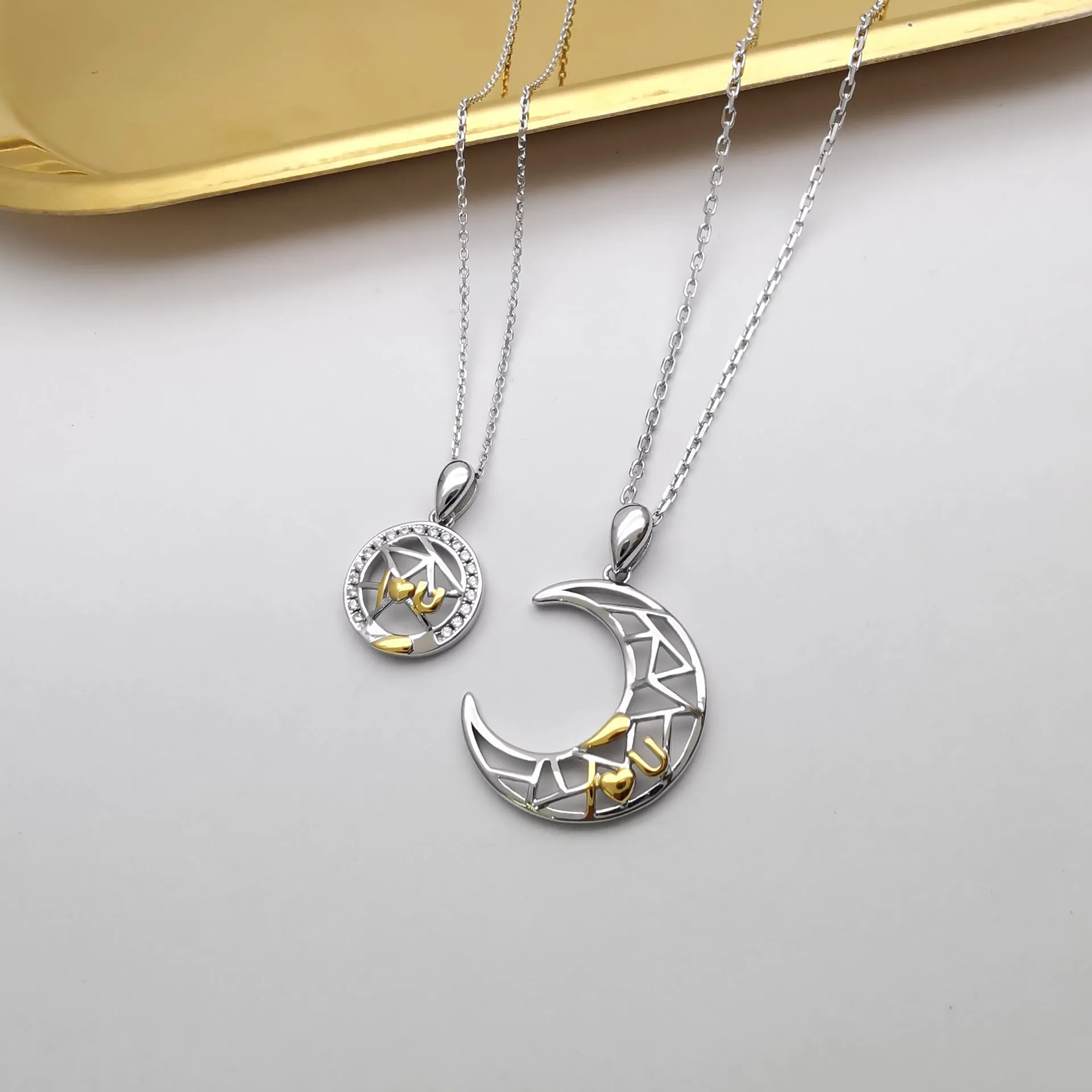 Copper sun moon couple necklace with electroplated finish and cross chain design
