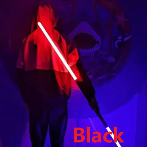Two 2-in-1 RGB metal lightsabers connected with adapter showing ten-colour glow and metal hilt on blue background