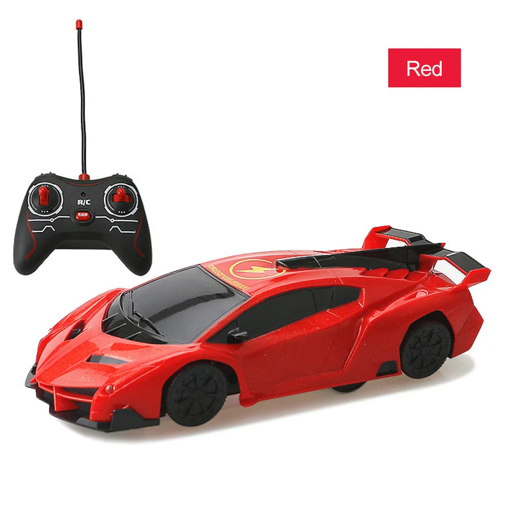 Remote control wall climbing car in red with industrial fan vents and white adsorbent strip on bottom, 1/28 scale