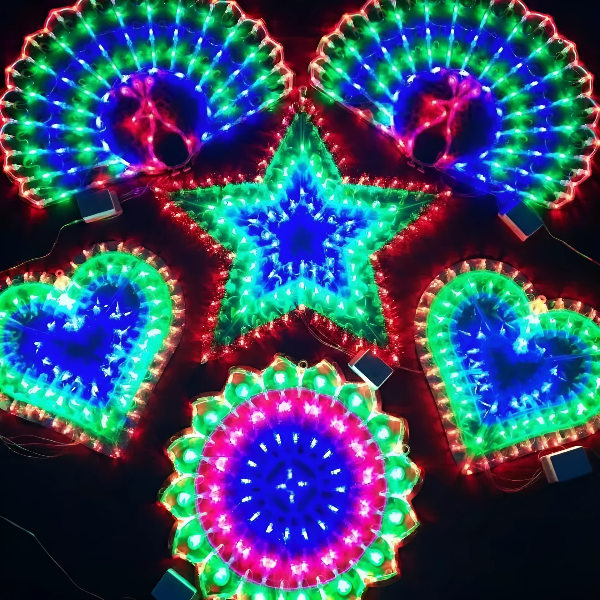 Christmas outdoor string lights with decorative shaped bulbs including peacock, heart, sunflower and star designs