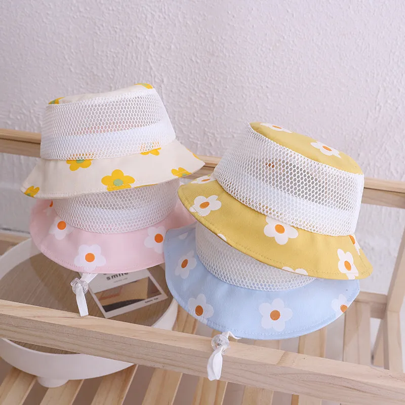 Floral baby bucket hat in blue with mesh fabric, side view showing brim and weft-knitted texture