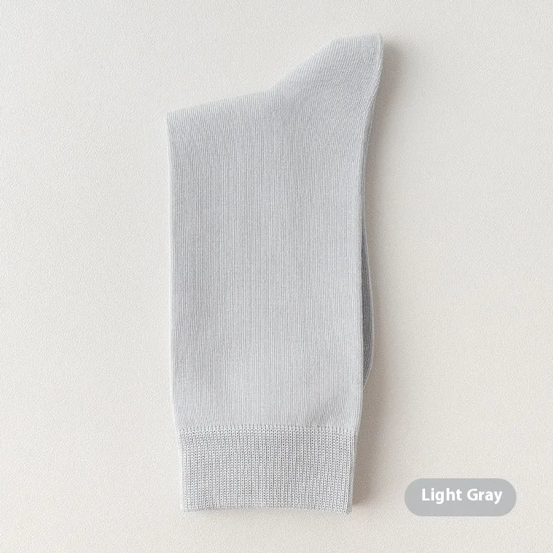 Mid-calf men's business socks in combed cotton available in twelve solid colours