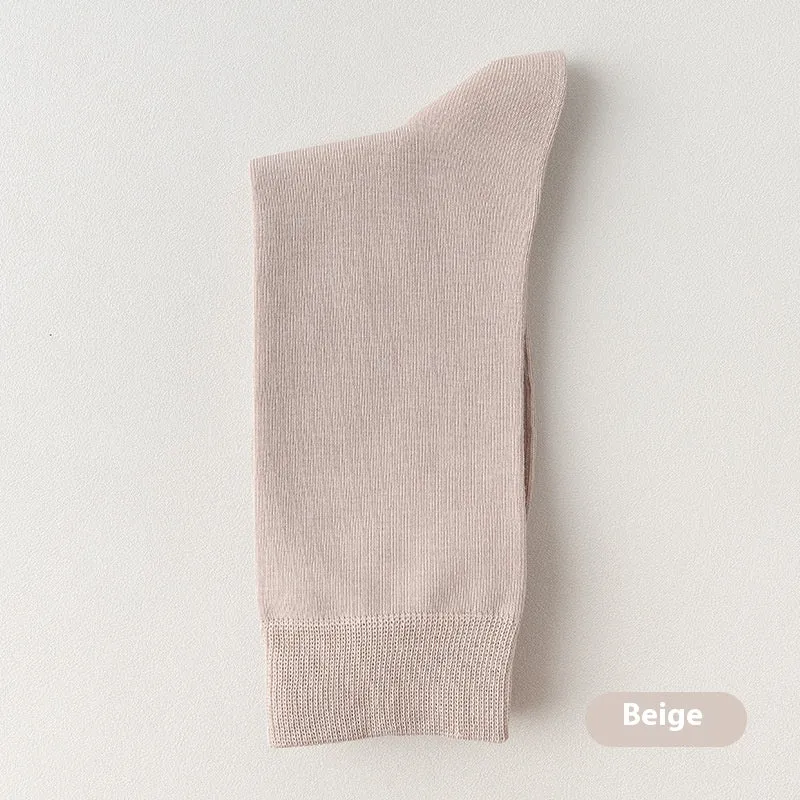 Mid-calf men's business socks in combed cotton available in twelve solid colours
