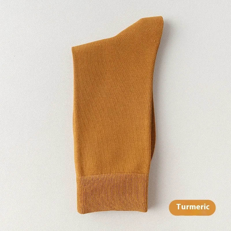 Mid-calf men's business socks in combed cotton available in twelve solid colours