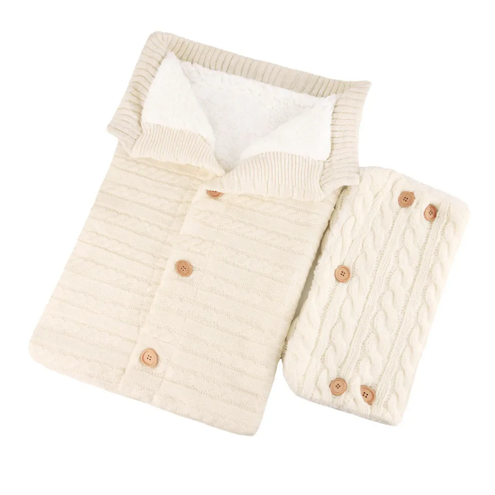 Baby sleeping bag in beige with pram handrail set and matching gloves