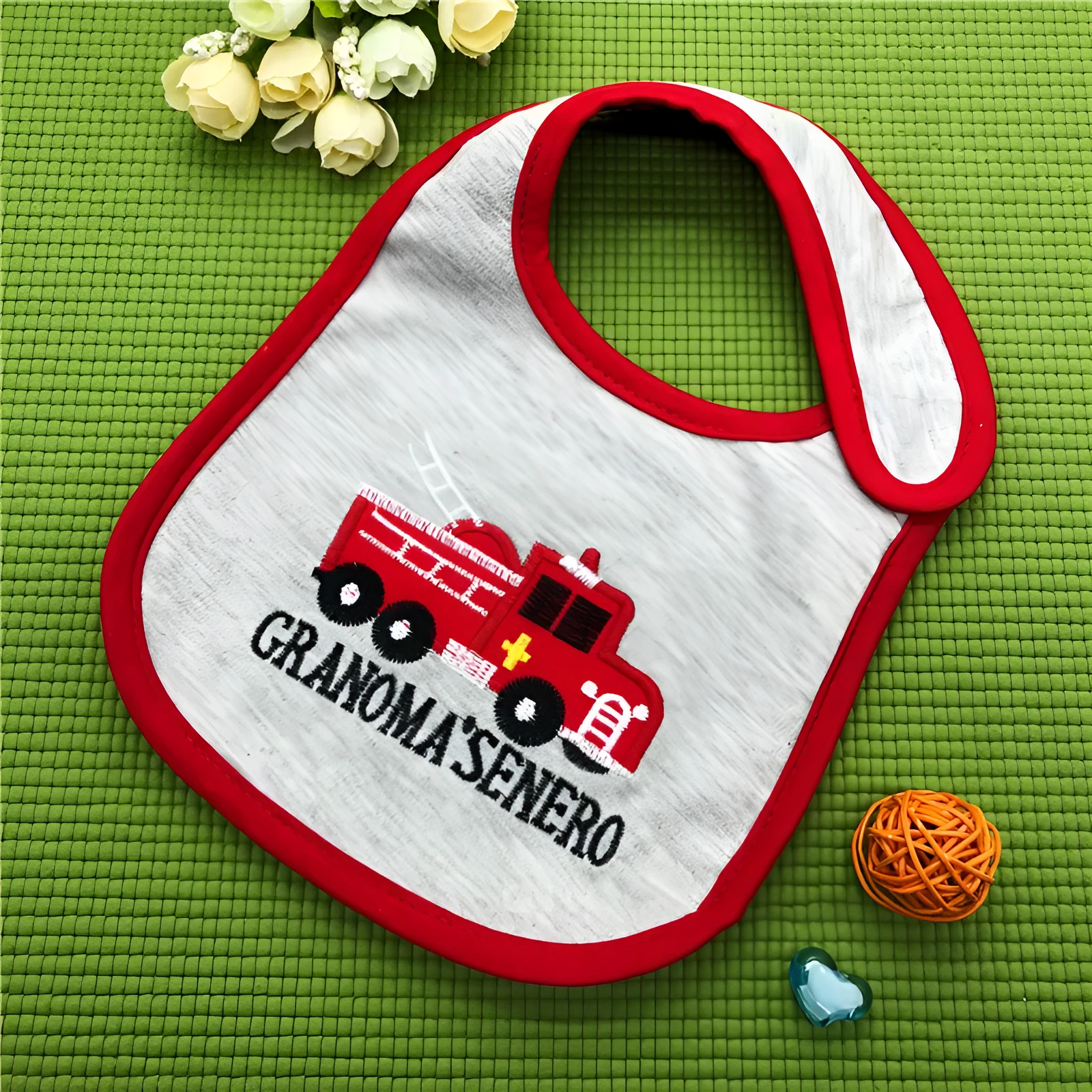 Three-layer waterproof polyester cotton baby bib with cartoon animal pattern in blue car design