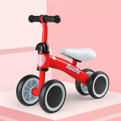 Plastic no-pedal baby balance bike with three wheels, carbon steel frame, EVA foam tyres, and artificial PU leather seat