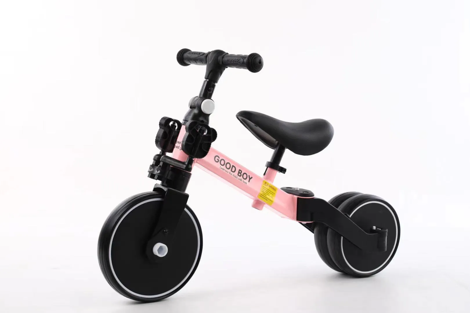 Plastic no-pedal baby balance bike with three wheels, carbon steel frame, EVA foam tyres, and artificial PU leather seat