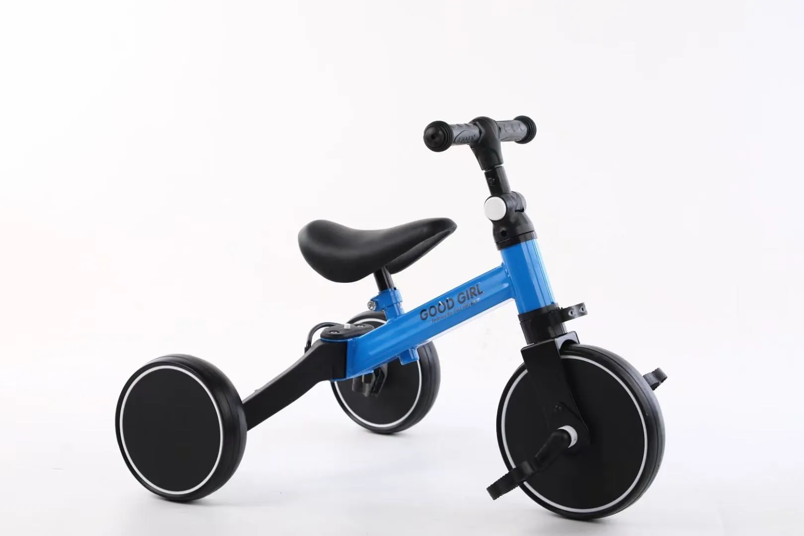 Plastic no-pedal baby balance bike with three wheels, carbon steel frame, EVA foam tyres, and artificial PU leather seat
